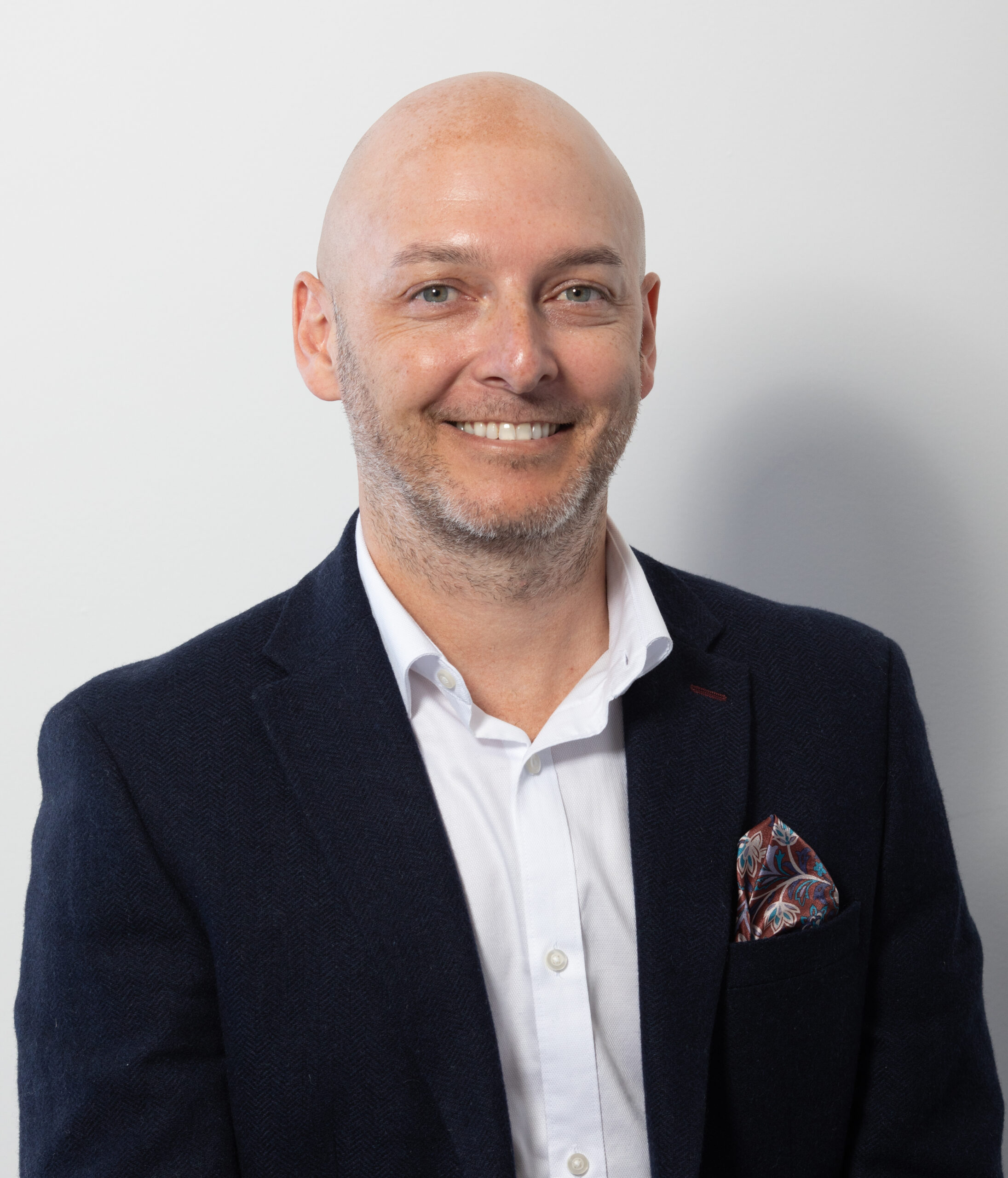 Executive headshot showing professional leadership presence online