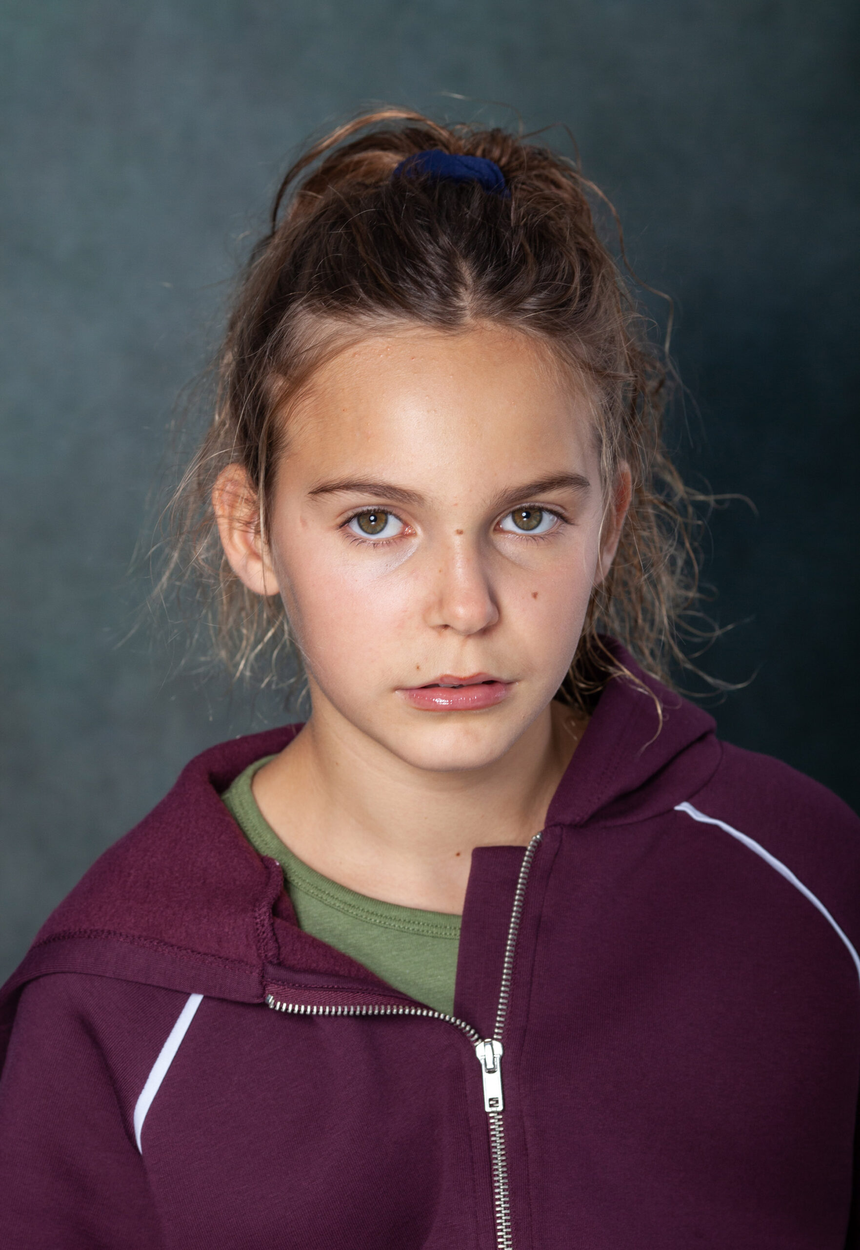 Young actor headshot with a more serious expression by Chris Barroccu